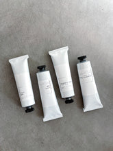 Load image into Gallery viewer, MACADAMIA LATTE &amp; CHAI LEAVES | HOLIDAY LIMITED EDITION ORGANIC ALOE FLOWER HAND LOTION